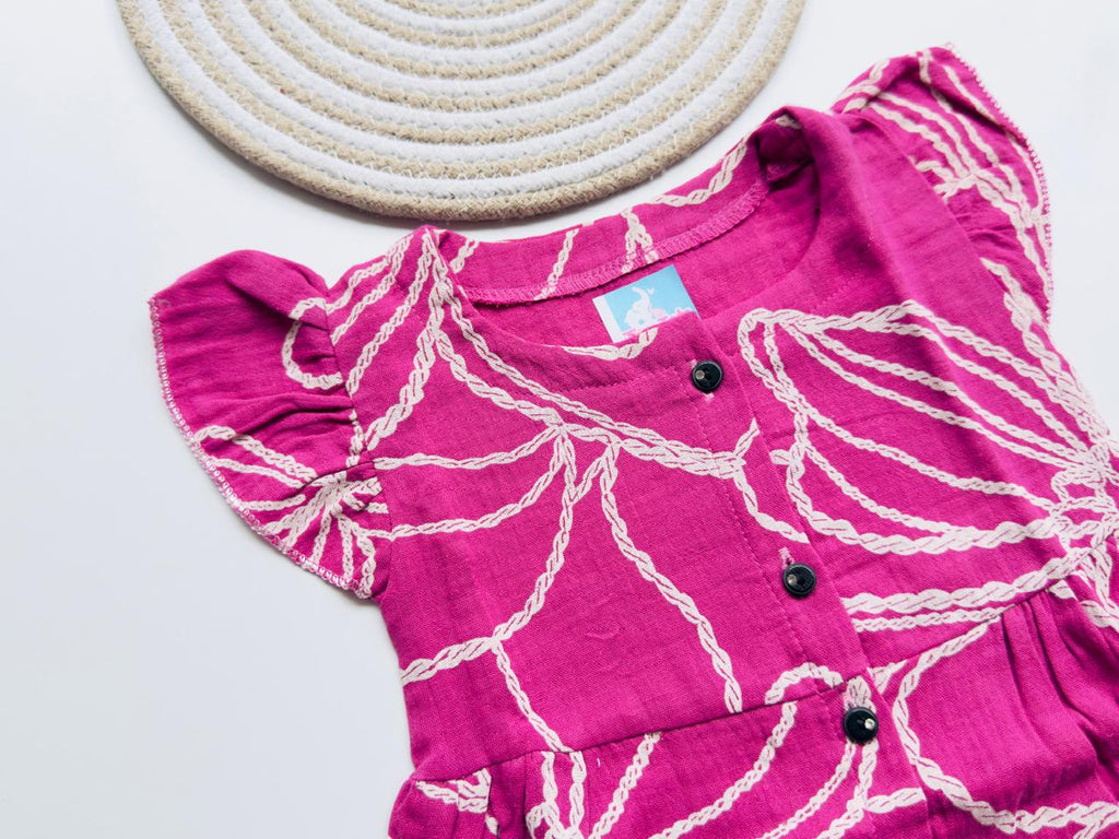 Bright Pink Muslin Frock with White Leaf Print for Girls – Soft, Breathable & Stylish