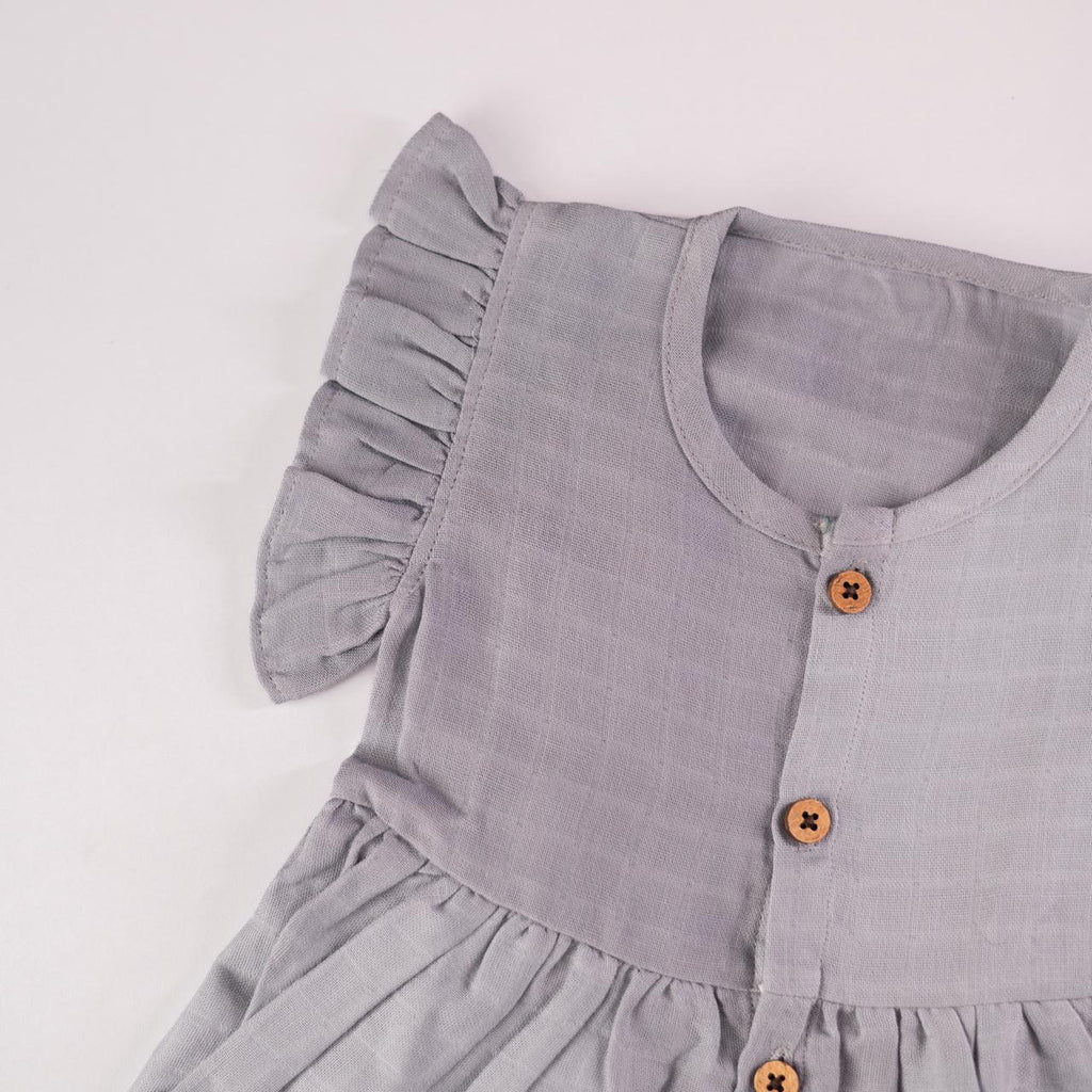 Grey Muslin Baby Frock with Wooden Buttons – Soft & Stylish