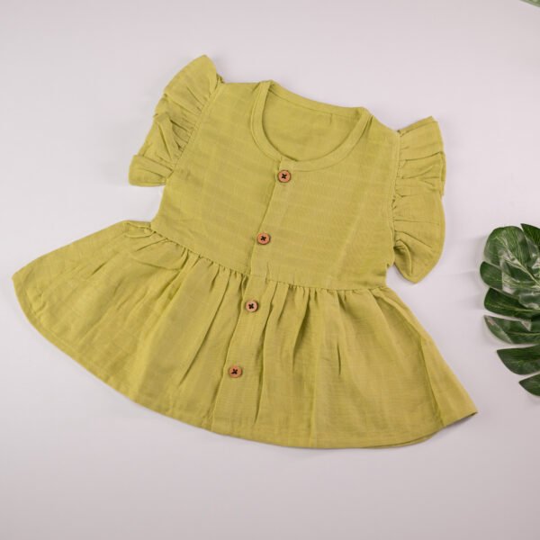 Green Muslin Baby Frock with Wooden Buttons – Soft & Stylish