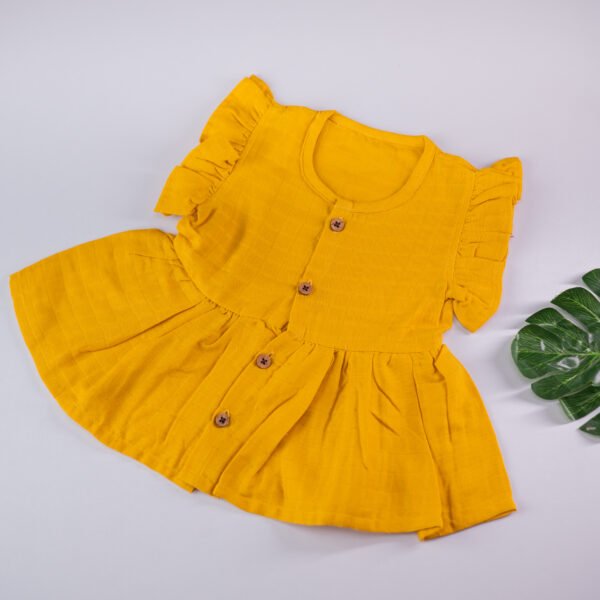 Mustard Yellow Muslin Baby Frock with Wooden Buttons – Soft & Stylish