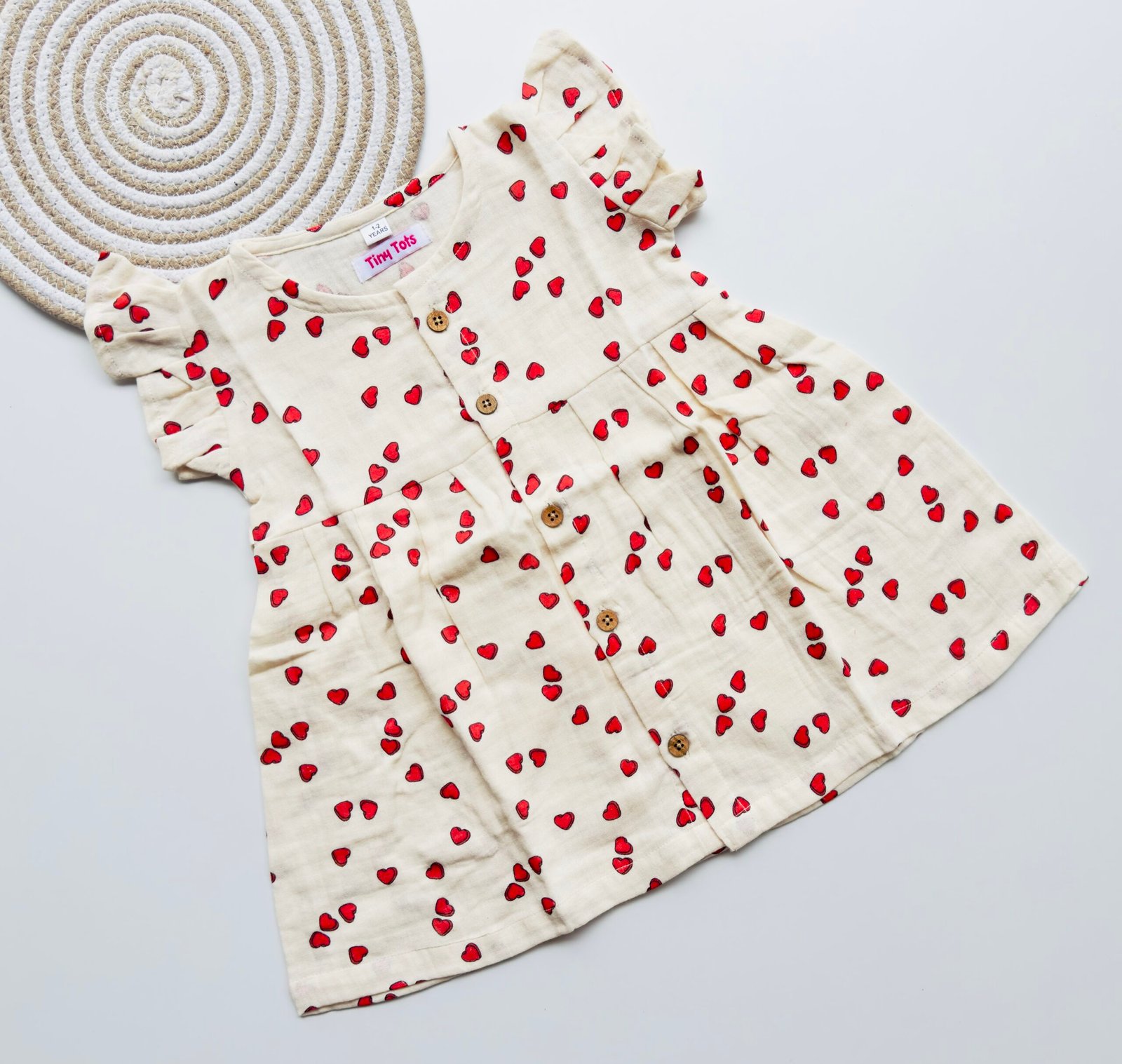 img_0643 Crinkle Muslin Heart Print Baby Frock – Soft, Breathable & Stylish - Image 1