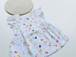 White Muslin Frock with Yellow Floral & Red Bow Print for Girls – Soft, Breathable & Stylish - Image 2
