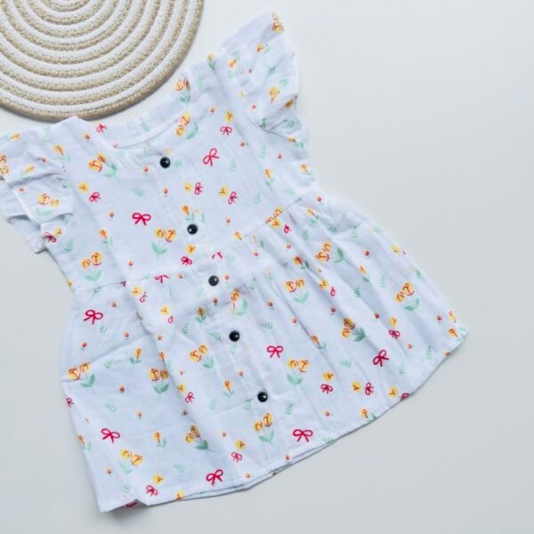 White Muslin Frock with Yellow Floral & Red Bow Print for Girls – Soft, Breathable & Stylish