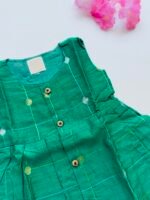 Green Ethnic Butta Sleeveless Silk Baby Frock With Wooden Buttons - Image 2