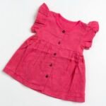 Magenta Muslin Baby Frock with Wooden Buttons – Soft & Stylish